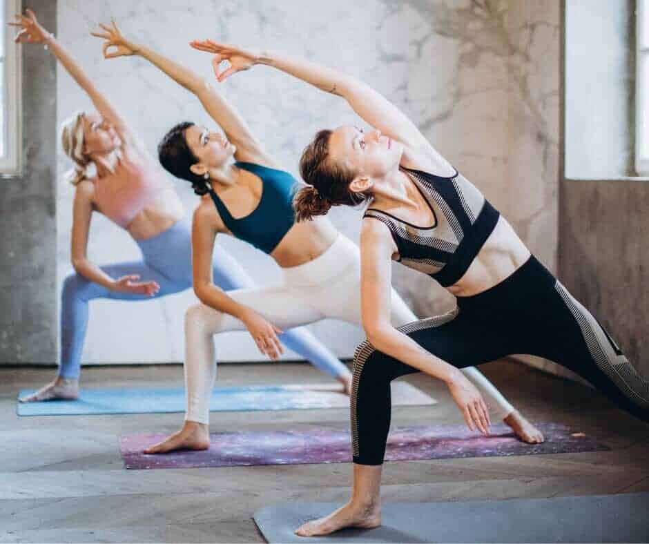 Picture of 3 people doing yoga