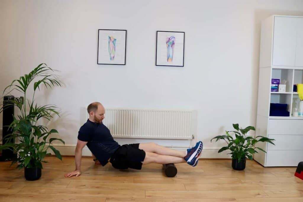 Picture of James McCormack Foam Rolling the calf muscles